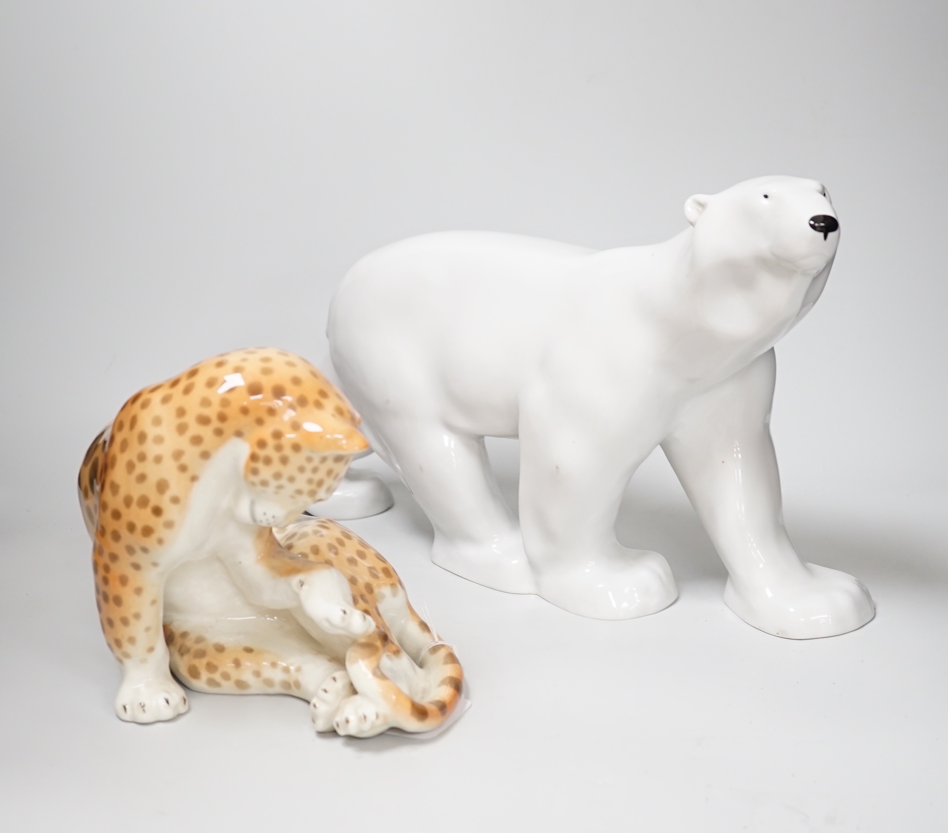 A USSR ceramic leopard and polar bear, latter 25cm high